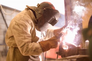 man wearing a welding helmet