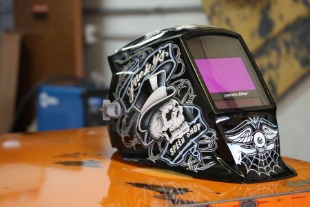 welding helmet on a table