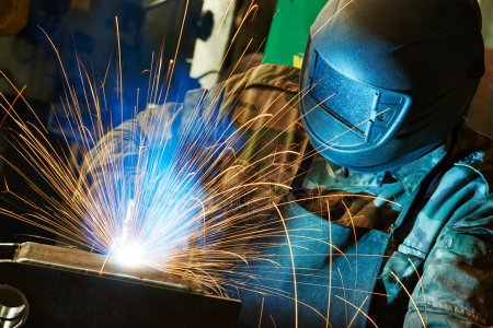 welder working with helmet